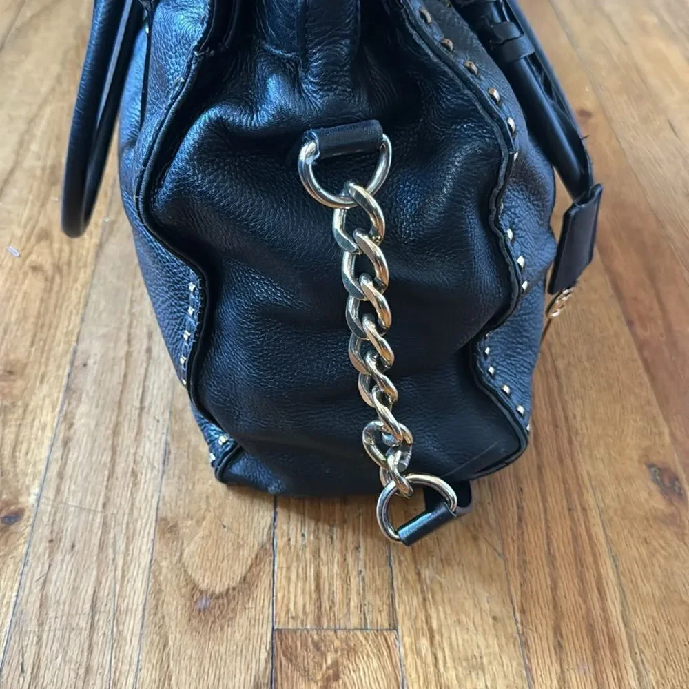 micheal kors black and gold stitched hamilton bag  with lock & key